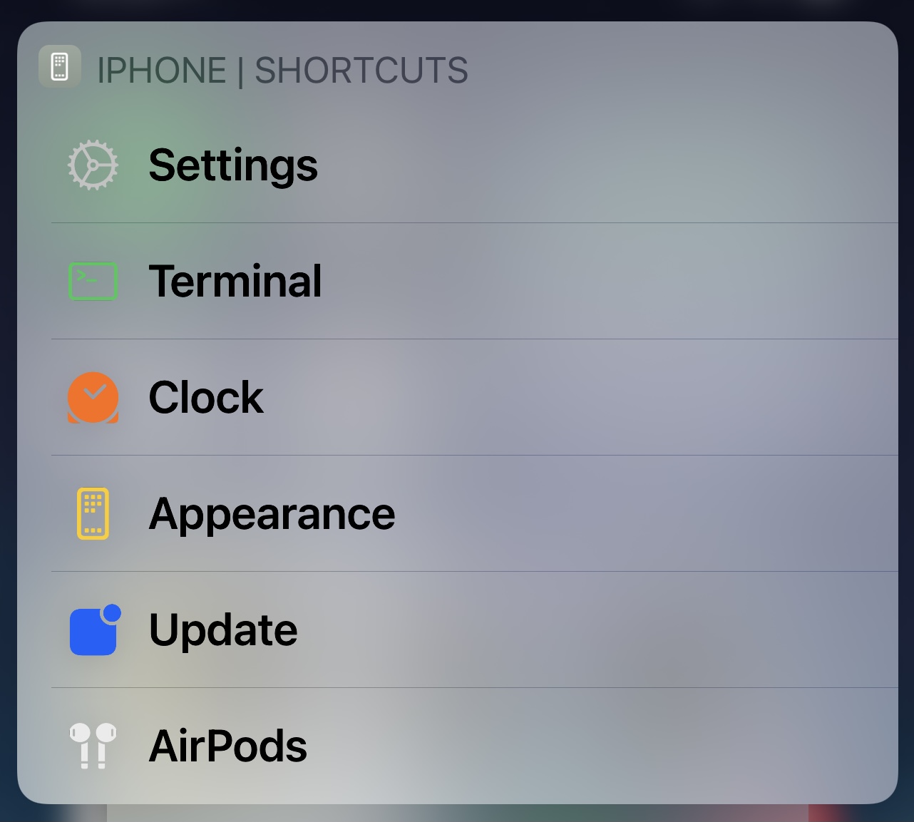 A menu with the title &lsquo;iPhone Shortcuts&rsquo;. From top to bottom the items read: Settings, Terminal, Clock, Appearance, Update and Airpods. Each has a small icon to the left of the text symbolising the names.